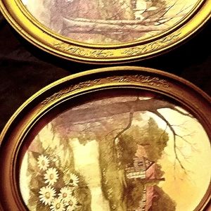 2 oval hand-painted photos with carvings on frame as a set in great condition.